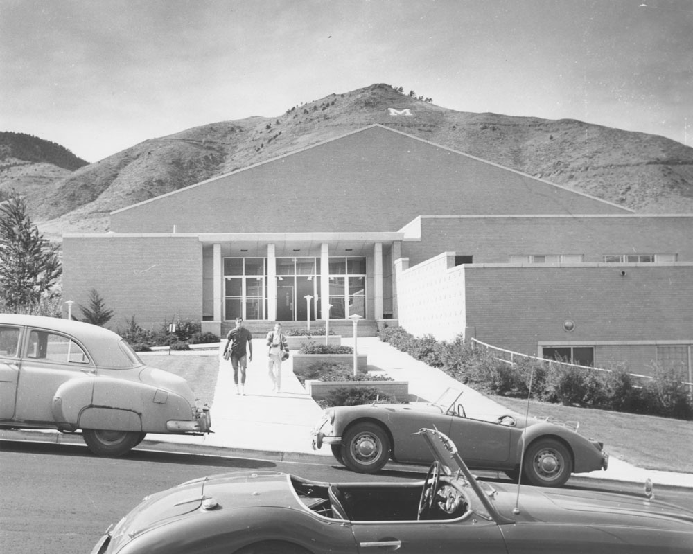 1960 Volk Gymnasium Replacing the old Gymnasium (photo on p. 15), the new gym was renamed after Russell H. Volk '26 in 1974 in honor of his athletic accomplishments (he earned a record 15 varsity letters in intercollegiate sports) and his broad involvement with Mines. (Photo: Russell & Lyn Wood Mining History Archive, Arthur Lakes Lib., CSM)