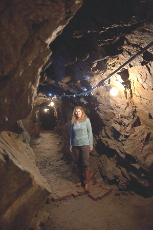 Holly Bidle stands inside the mine accessible from her home's laundry room. (Courtesy of Holly Bidle)