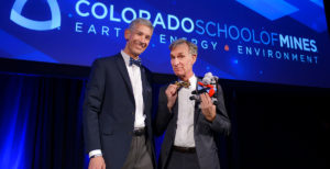 Paul C. Johnson and Bill Nye wearing matching bowties