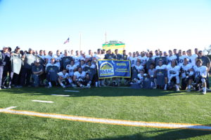 Mines football team pose for their RMAC championship photo