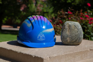 Hard hat and rock