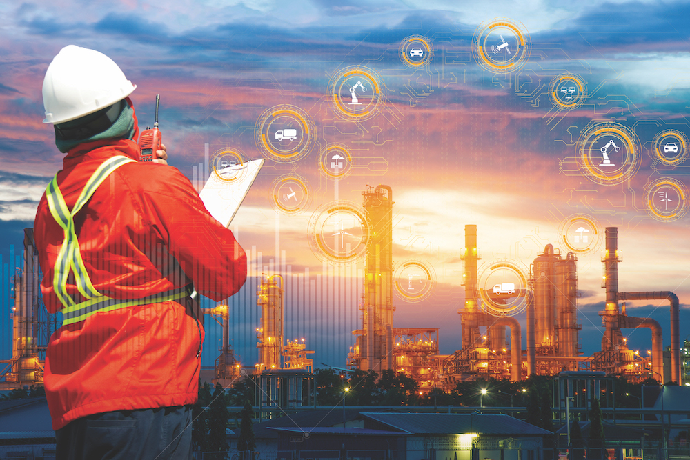 Oil refinery with person