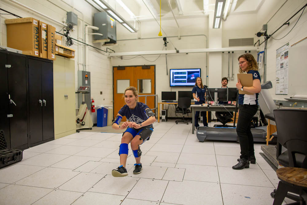 Anne Silverman directing a student through a biomechanics test in a Mines lab